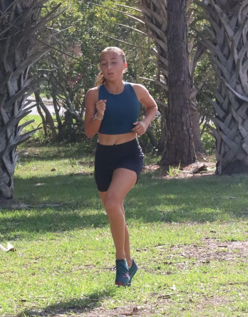 Sophomore cross country runner Brennan Baryza practices at Picnic Island. 