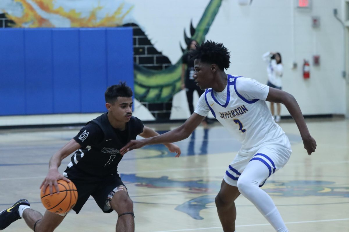 Zyon Floyd ('26) faces up against a Jefferson Dragon. "Hopefully we can bring this [motivation] into our second home game," Floyd said.