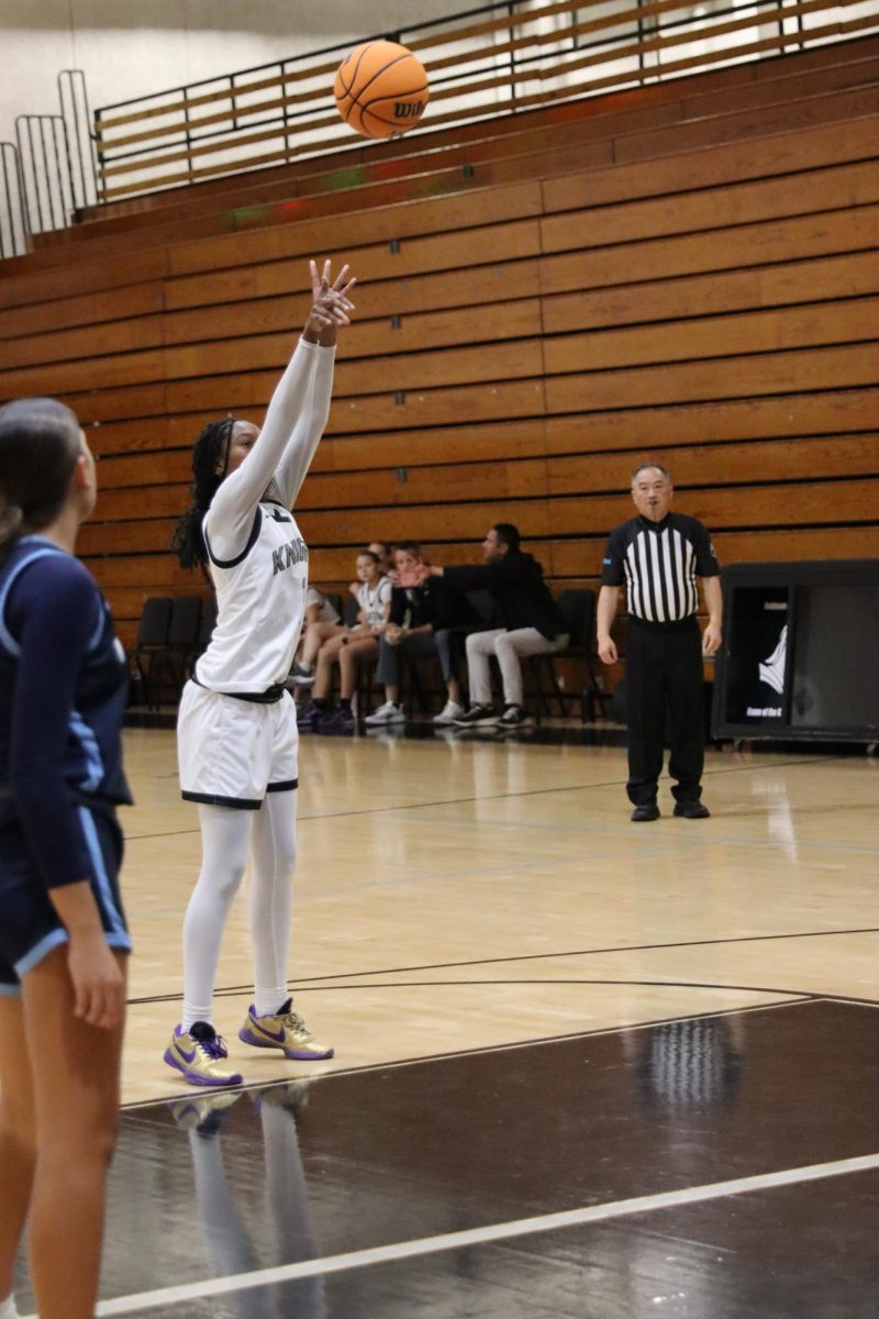 Niamaya Fraser ('26) makes free throw to add to the knight's commanding lead.