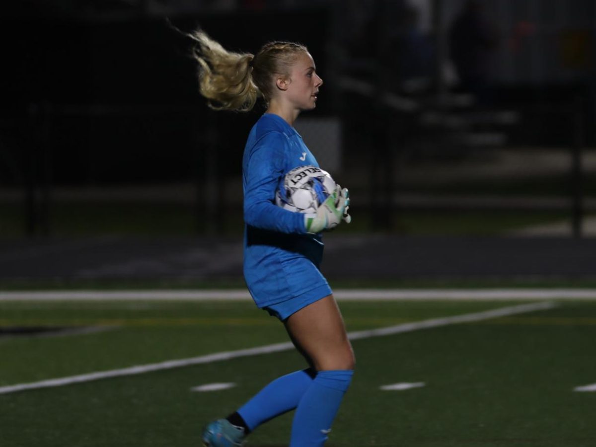 Goalkeeper Delilah Burns with the ball 