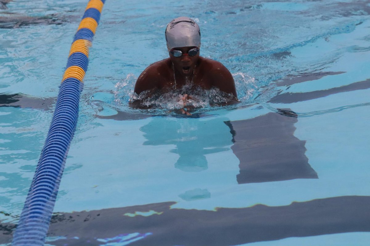 Boys' swimmer Abhiram Ummedisetti ('28) participating in a Swim Competition's Breaststroke.