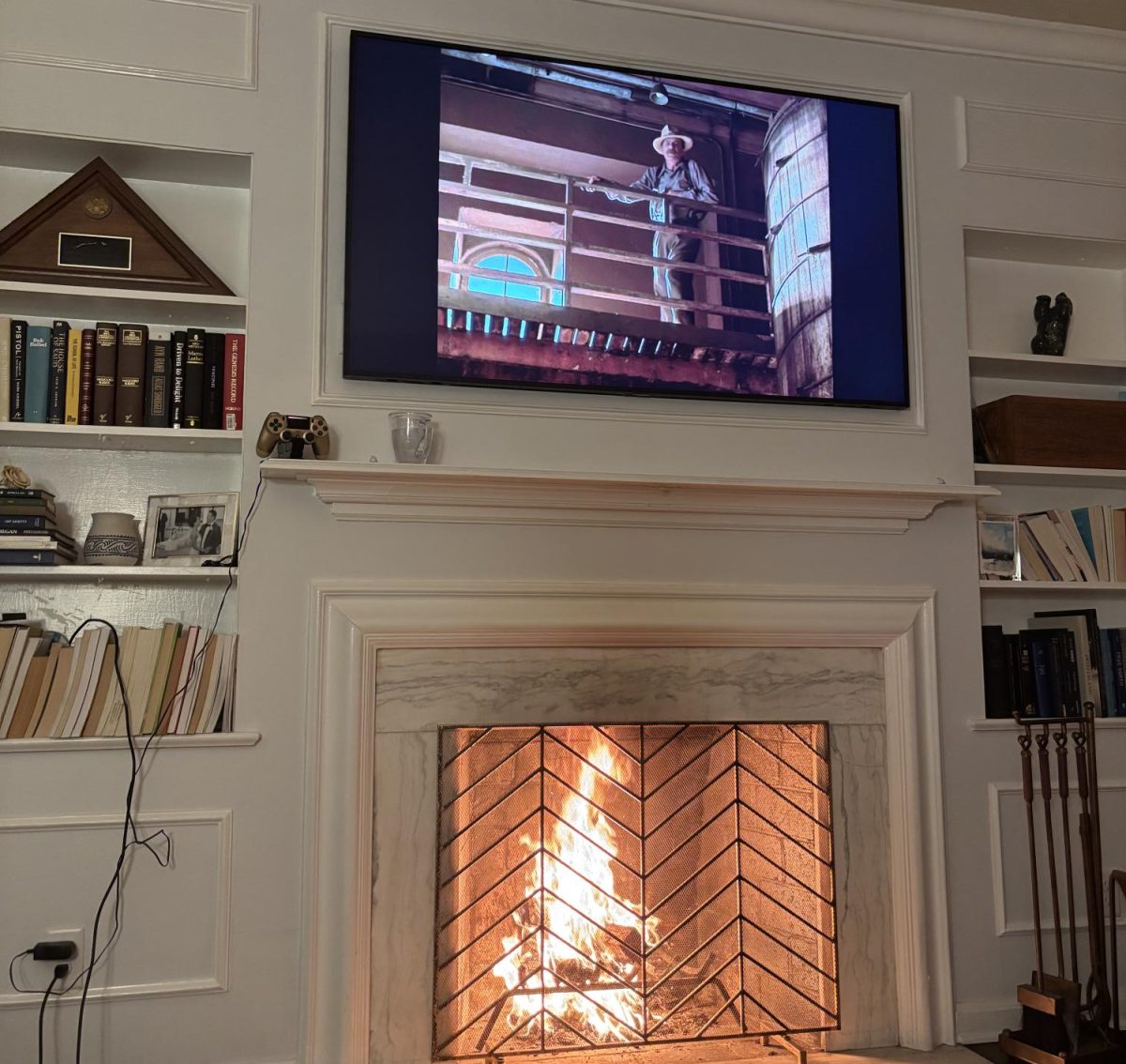 Cozy movie by a fireplace.