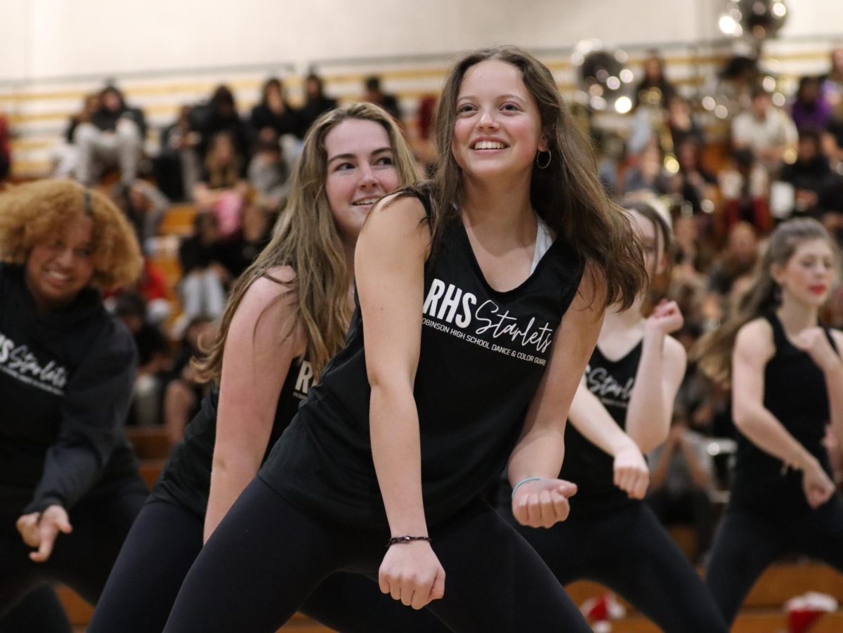 Starlet Auroa Bartholomay ('26) dancing at the winter sports pep rally. 