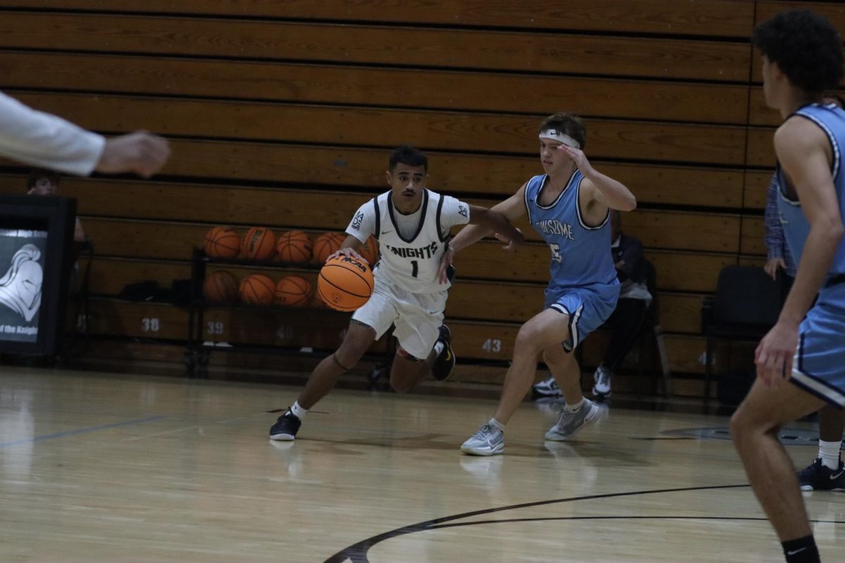 Zyon Floyd driving inside forcing for an open layup.