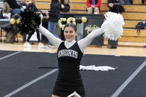 Maddie McCauley ('25) taking her position at the start of Robinson's routine.