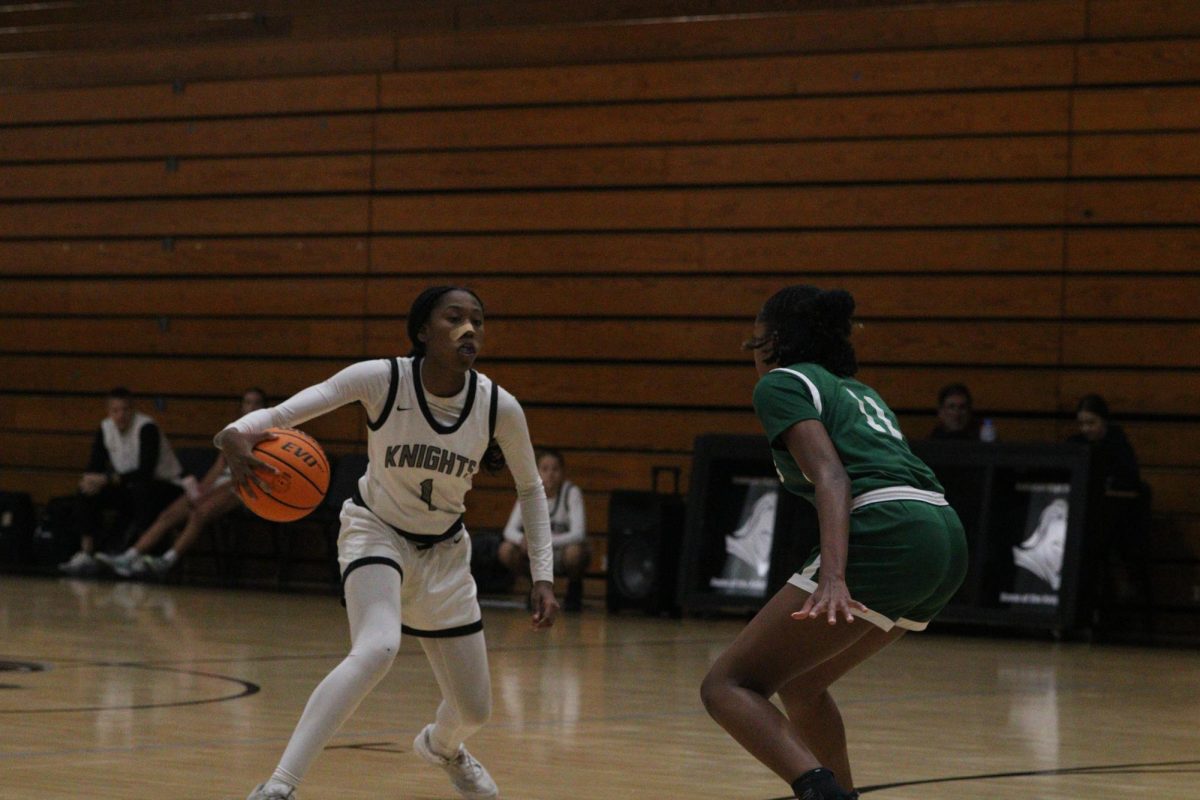 Point Guard Niamaya Fraser ('26) moves between Sickles to get in shooting range. When in the game she's, "Just staying focused, just like knowing were I'm at on defense, offense, making the right passes."