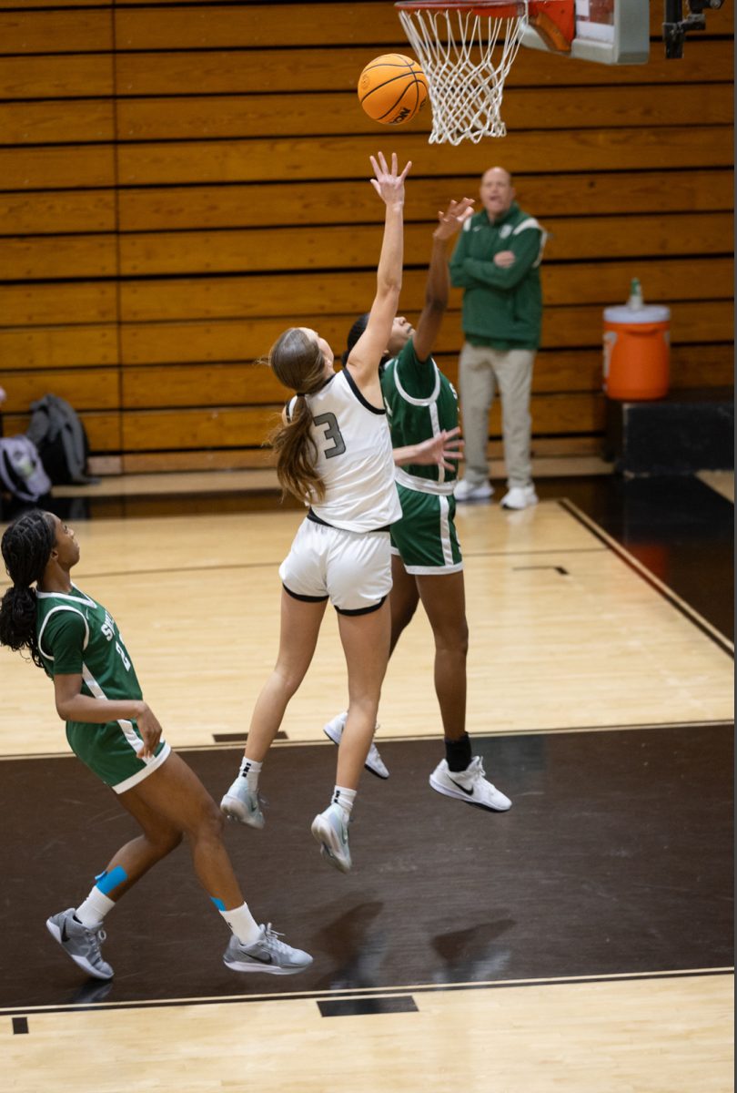 Annie Keith goes up for a block.