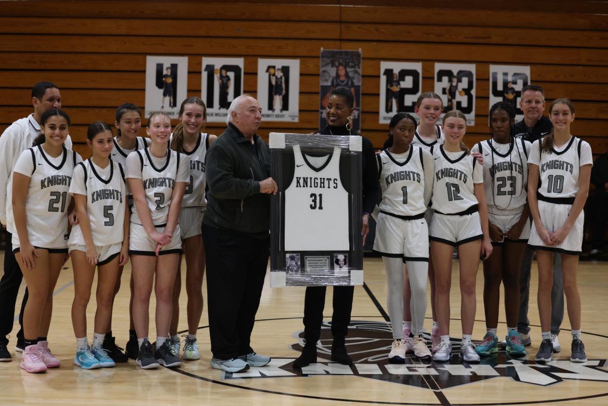 Harriet Brumfiled ('81) at her jersey retirement ceremony.