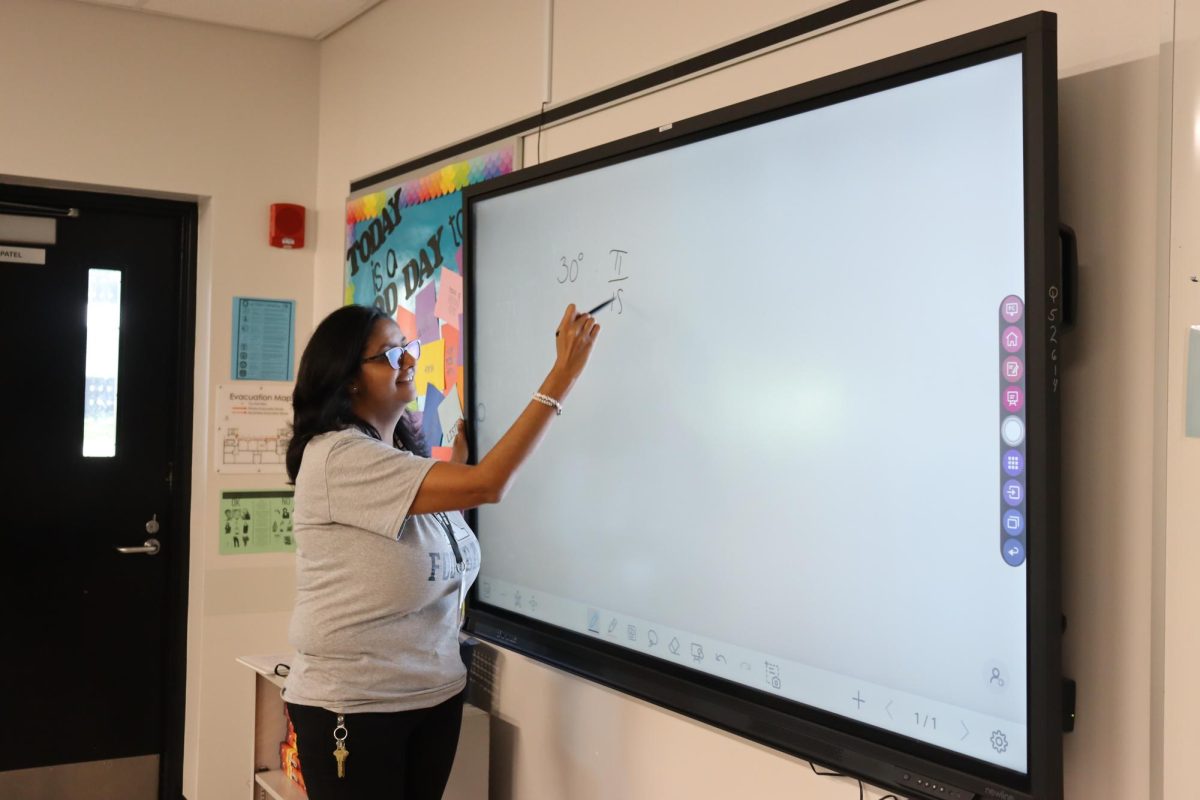 Patel walking her students through a math problem