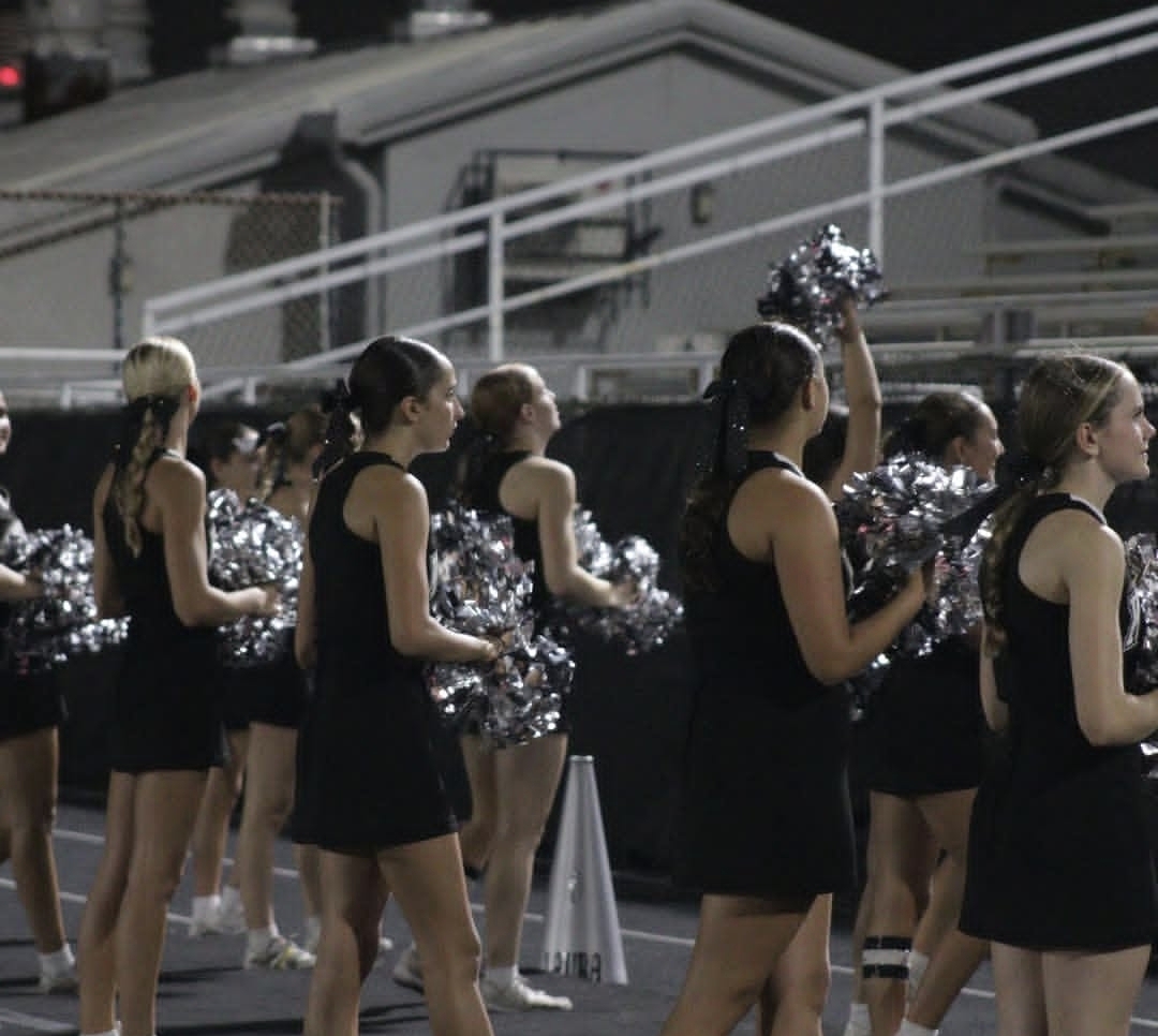 Cheerleaders generate school spirit.