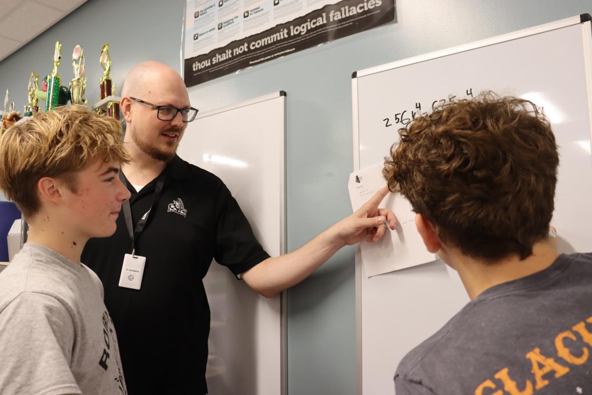 The new mathematics teacher, Mr. Heinsen, teaching his students.