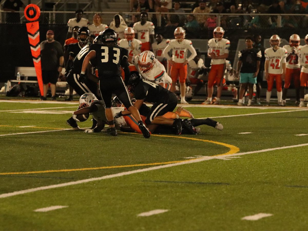 Robinson Players tackle a plant city player.