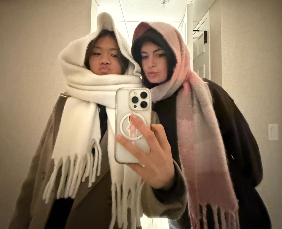 Ryan Rolle and Sophie Le ('26) bundled up.