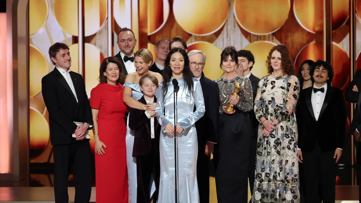 Director Chloé Zhao and cast after winning "Best Drama Motion Picture" for the 2025 film, Hamnet.