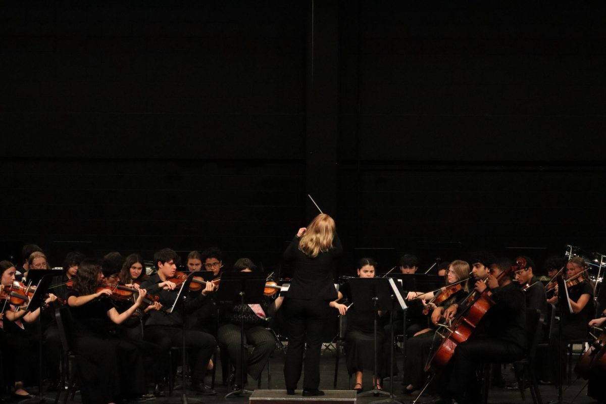 Advanced orchestra students play "La La Land" soundtrack. 