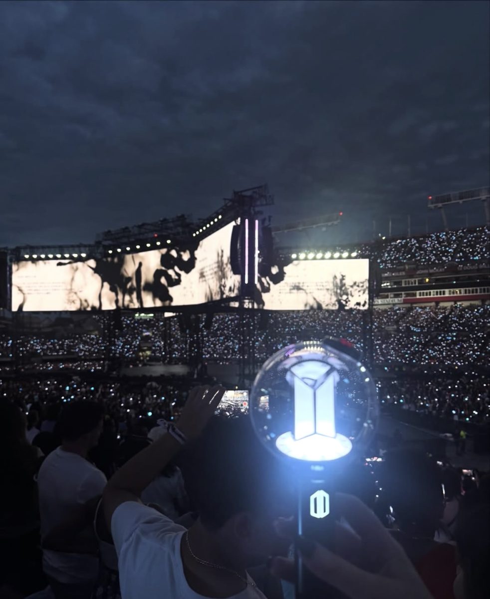 Holding my BTS light stick like my life depends on it!